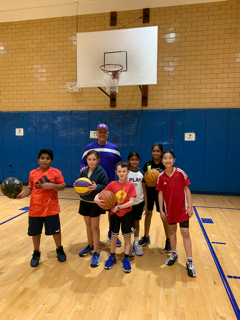 The Commissioner teaching kids to play basketball 11/22